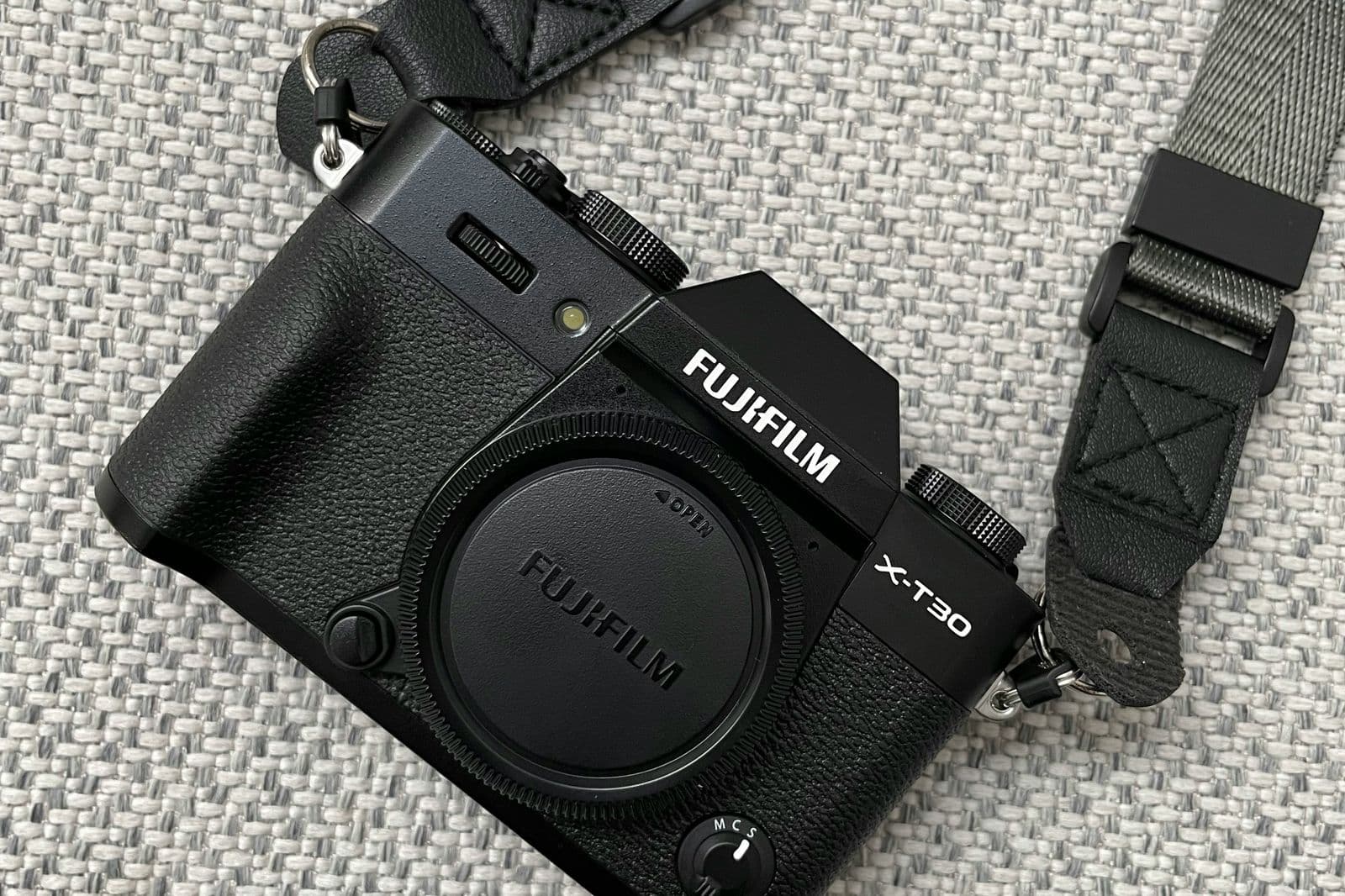 Photographer working with a Fujifilm camera